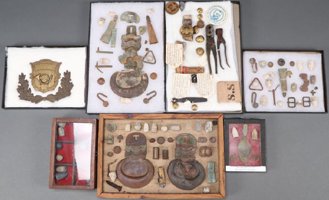 A GROUP OF OVER 150 CIVIL WAR REGALIA AND RELICS: A GROUP OF OVER 150 CIVIL WAR REGALIA AND RELICS. Comprising a vast array of insignia and battlefield found accoutrements, projectiles, and various other articles. Including a large cavalry shield and