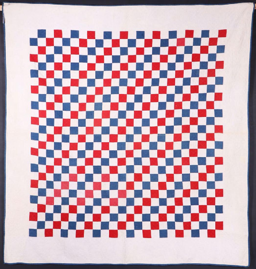 A 19TH CENTURY TEXTILES GROUP: A 19TH CENTURY TEXTILES GROUP. Comprising a red, white and blue block quilt, a red, white and blue overshot woven comforter, and an ABC stitched sampler by Amanda Pruter, 1875. The largest quilt 80 i