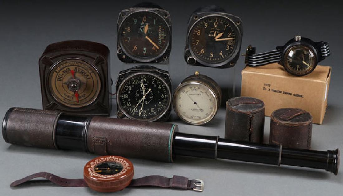 A GROUP OF VINTAGE AVIATION INSTRUMENTS: A GROUP OF VINTAGE AVIATION INSTRUMENTS, CIRCA 1930-40S. Including two altimeters, and a 24 hour eight day clock. Together with a barometer/compass (19th century) in brass housing, a diver’s wrist g