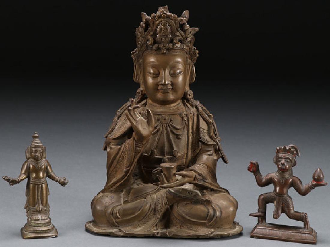 A GROUP OF THREE SINO-TIBETAN BRONZE DEITIES (1 of 7)