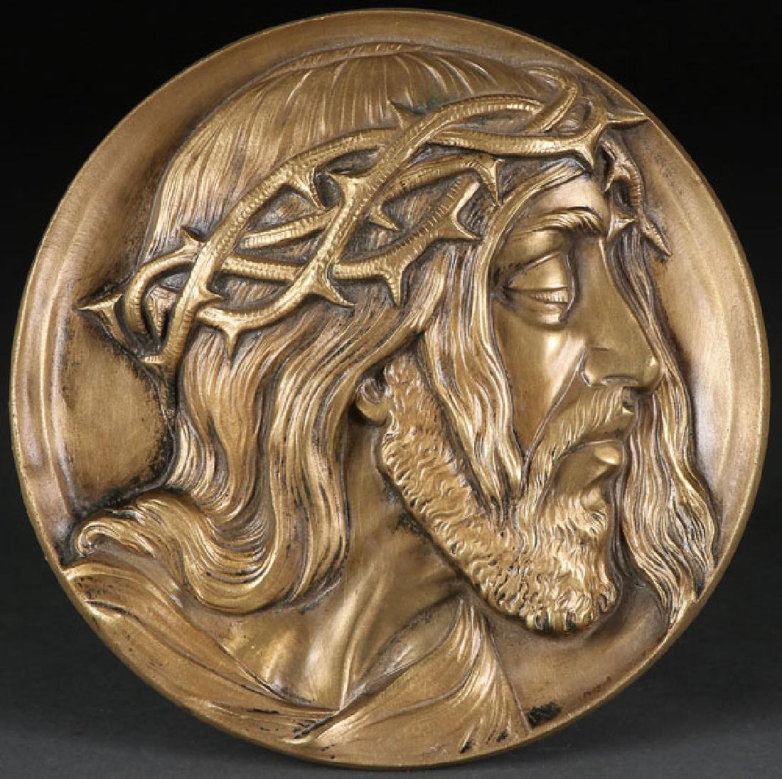 A CAST BRONZE RELIEF PLAQUE OF CHRIST (1 of 2)