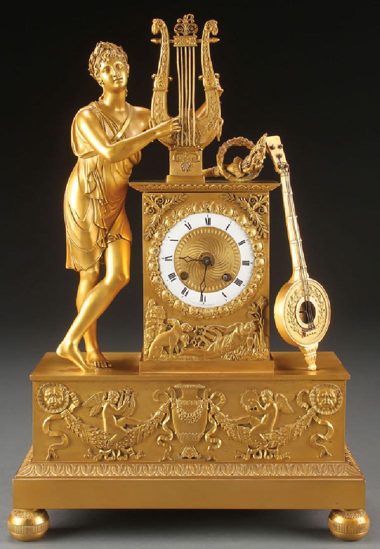 A FINE FRENCH EMPIRE GILT BRONZE MANTLE CLOCK (1 of 7)