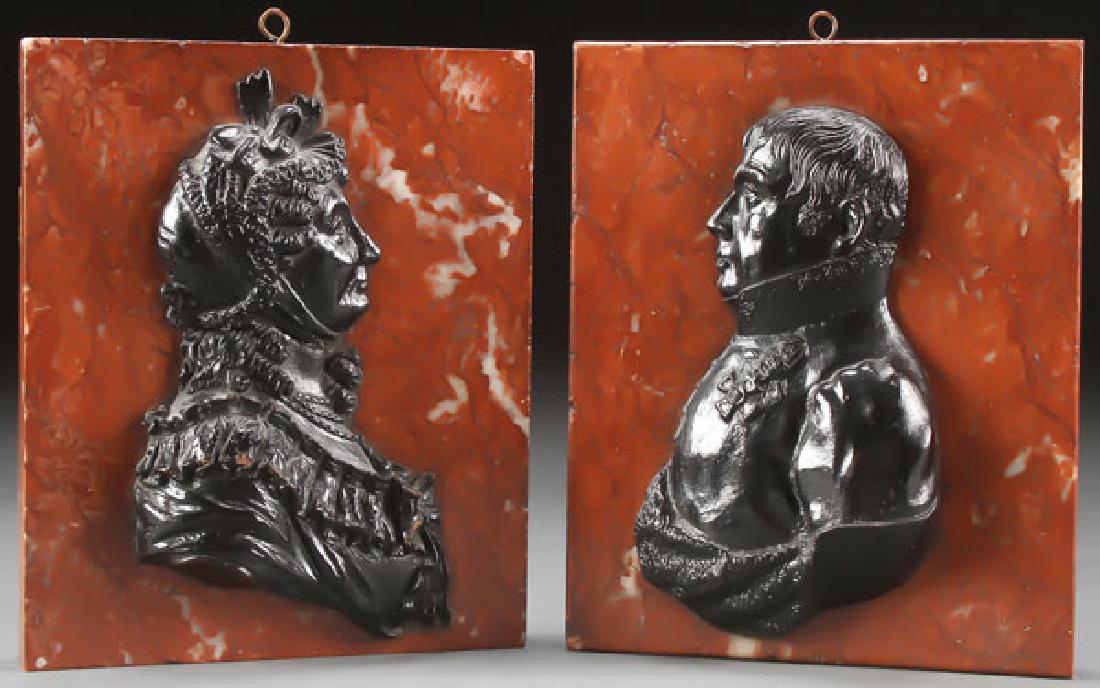 A PAIR OF CAST IRON RELIEF PROFILE BUST PLAQUES (1 of 1)
