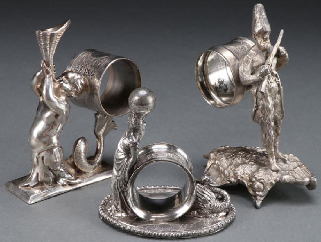 3 VICTORIAN SILVERPLATE FIGURAL NAPKIN RINGS (1 of 1)