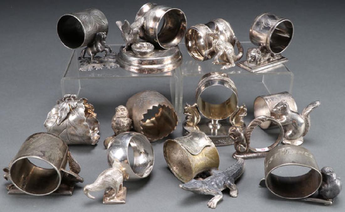 13 VICTORIAN SILVERPLATE FIGURAL NAPKIN RINGS (1 of 1)