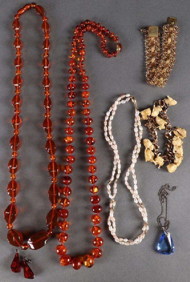 A COLLECTION OF AMBER, PEARL, AND IVORY JEWELRY (1 of 1)