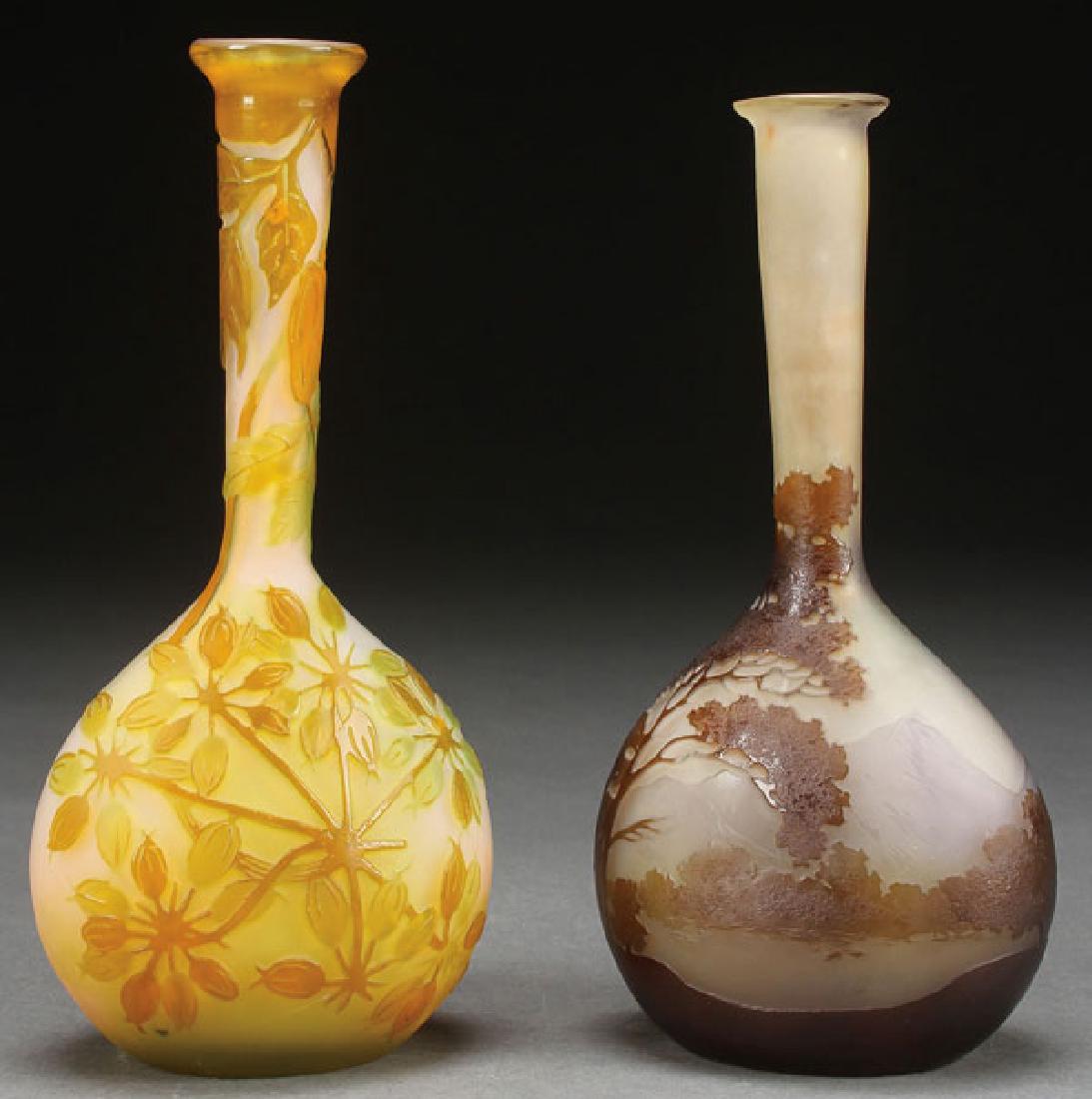 A PAIR OF GALLE FRENCH CAMEO ART GLASS VASES: A PAIR OF GALLE FRENCH CAMEO ART GLASS VASES, CIRCA 1900. Each of bottle form depicting a mountain scene in grey colored glass overlaid with blue and olive, and in opalescent colored glass internally