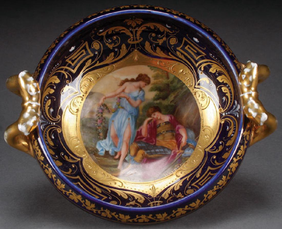 A ROYAL VIENNA STYLE SCENIC LOW BOWL, CIRCA 1900: A ROYAL VIENNA STYLE SCENIC LOW BOWL, CIRCA 1900. With hand painted romantic scene of young beauties. Artist signed “Werner”. The base with blue beehive mark. Diameter 7 inches (17.6 cm). SHIPPING