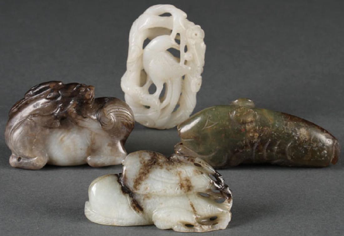 A GROUP OF FOUR CHINESE CARVED JADE ORNAMENTS (1 of 5)