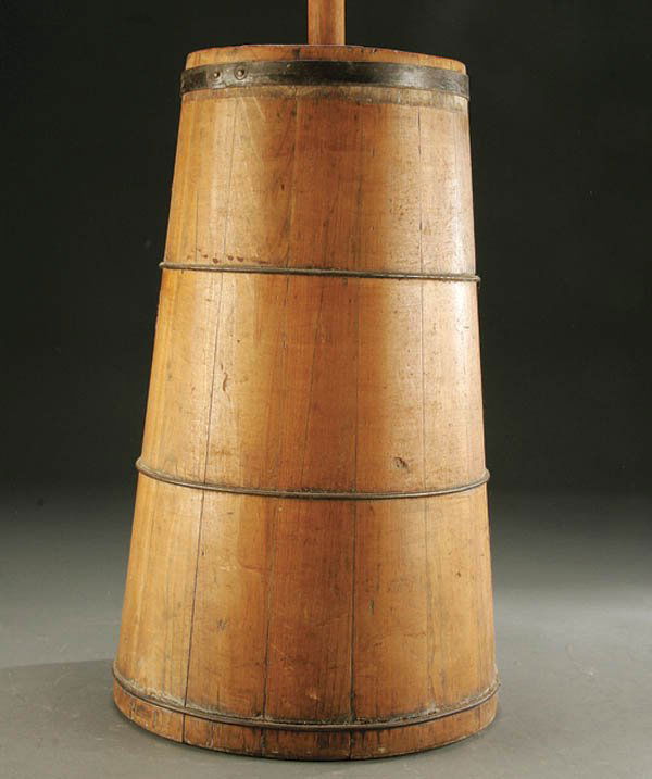 A FINE WOODEN BUTTER CHURN with dasher and lid.: A FINE WOODEN BUTTER CHURN with dasher and lid. 4 steel bands. Height 22''. Estimate $75-$150