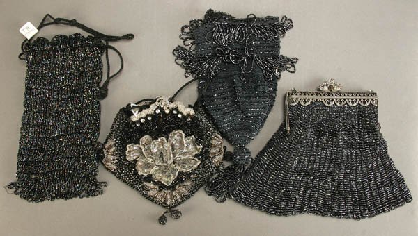 4 VINTAGE LADIES BEADED CARNIVAL GLASS BAGS inclu: 4 VINTAGE LADIES BEADED CARNIVAL GLASS BAGS including reticulate silvered frame and drawstring varieties. Largest 9 inches in length. Estimate $150-$250