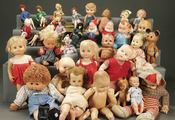 A LOT OF VINYL DOLLS including Chatty baby and Ge: A LOT OF VINYL DOLLS including Chatty baby and Gerber with artist dolls, all porcelain. Estimate $100-$150