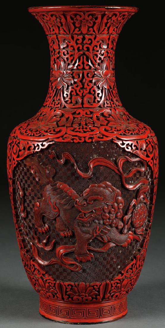 A CARVED CHINESE RED LACQUER CINNABAR VASE (1 of 2)
