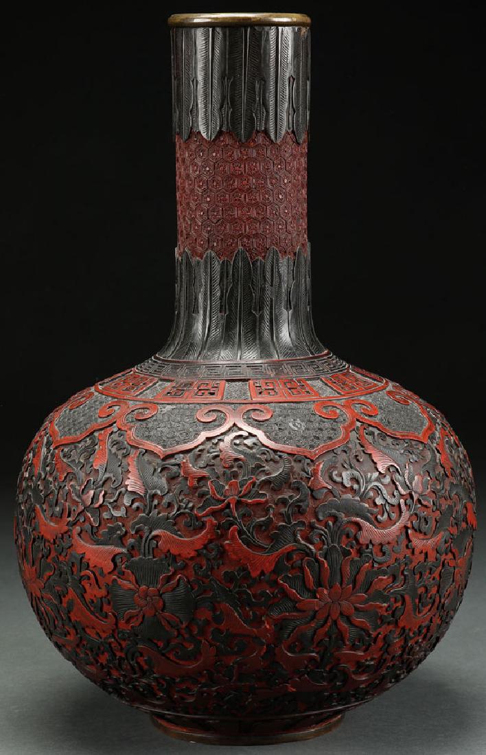 A CHINESE TWO COLOR CARVED CINNABAR BOTTLE VASE (1 of 8)