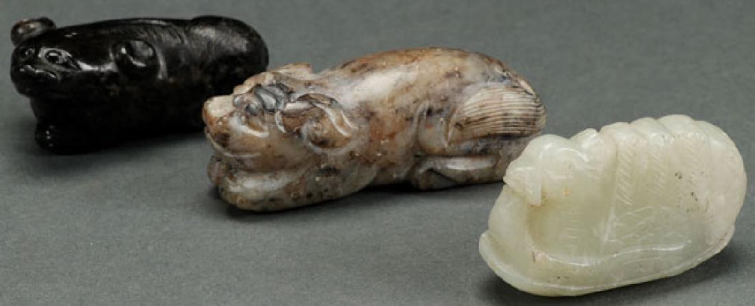 A GROUP OF THREE CHINESE CARVED JADE FIGURES (1 of 1)