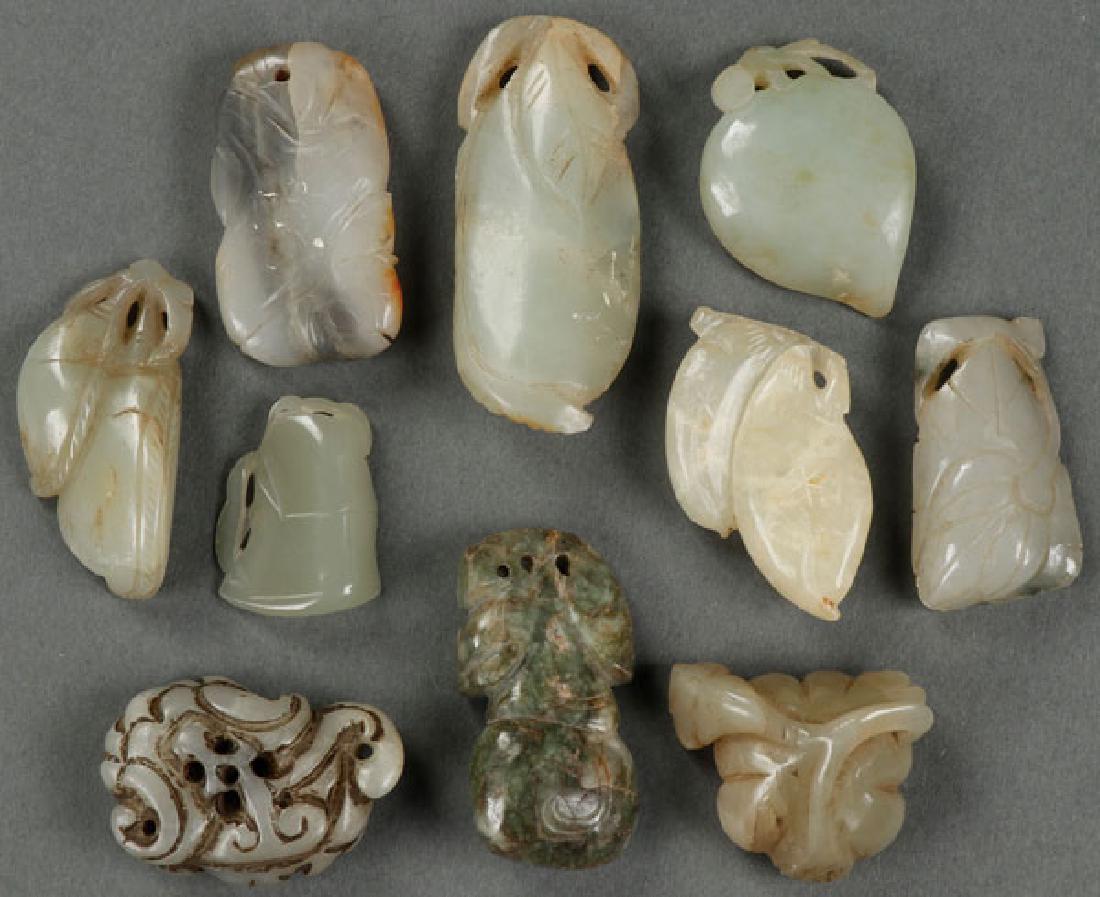 A GROUP OF TEN CHINESE CARVED JADE ORNAMENTS (1 of 1)
