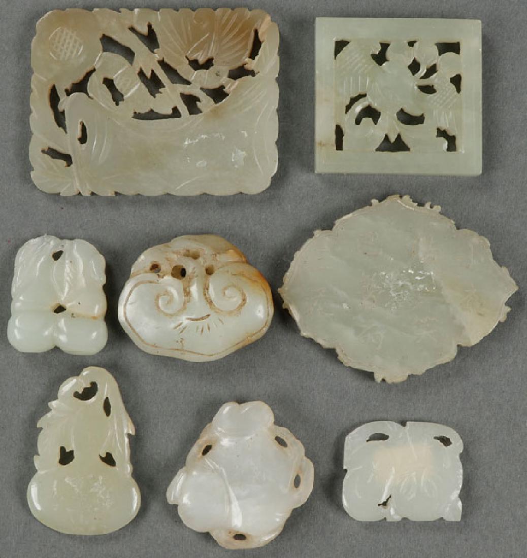 A GROUP OF EIGHT CHINESE CARVED WHITE JADE (1 of 1)