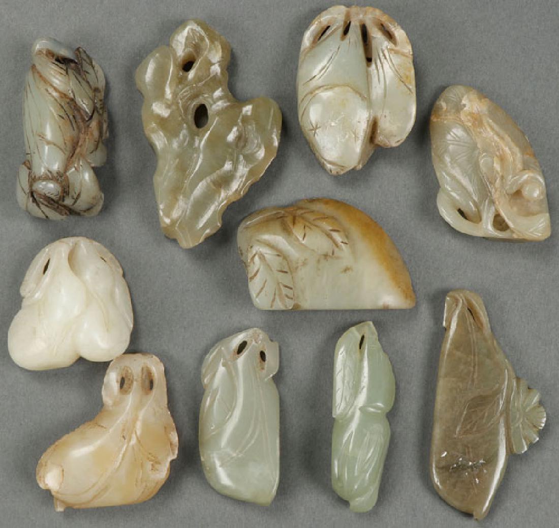 A GROUP OF TEN CHINESE CARVED JADE PENDANTS (1 of 1)