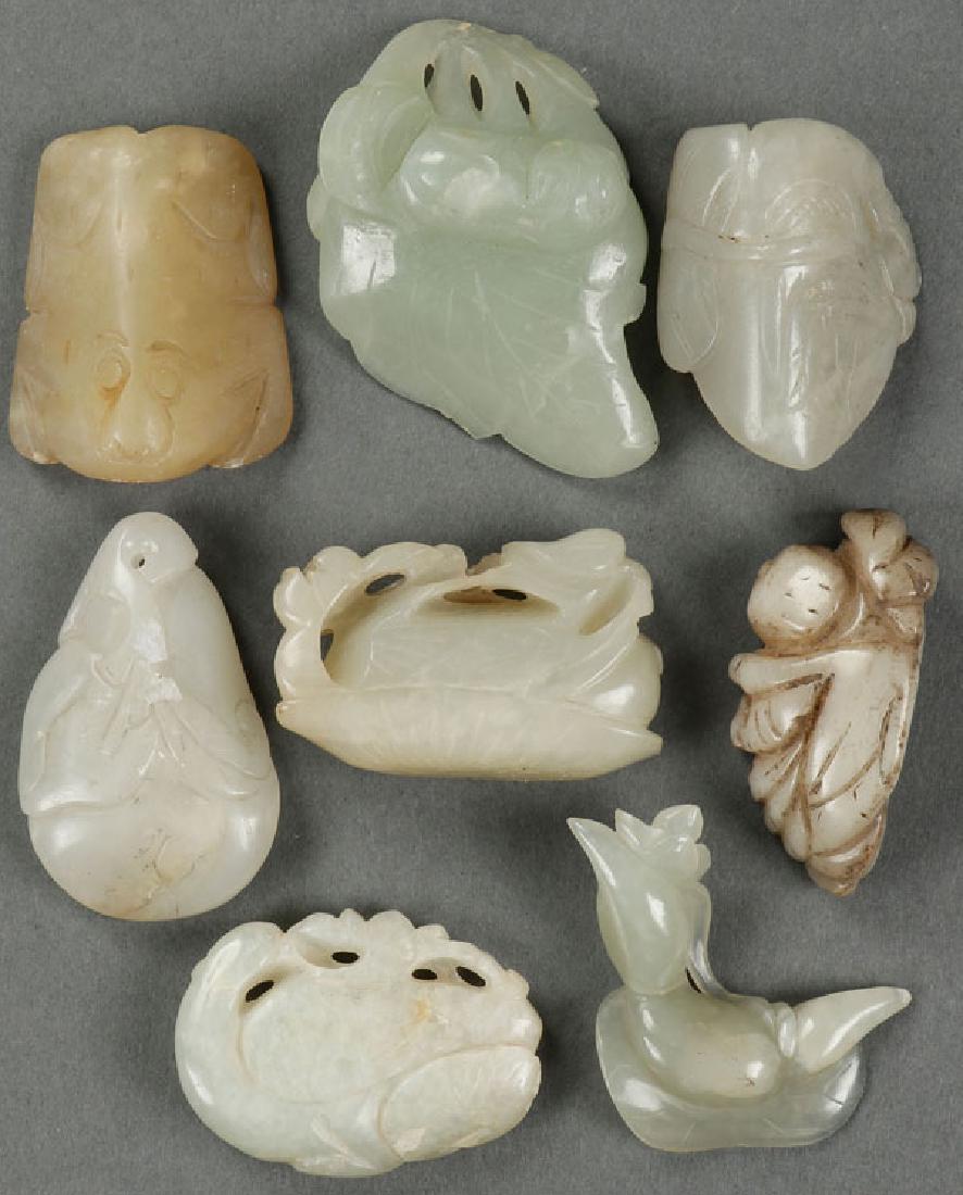 A GROUP OF EIGHT CHINESE CARVED JADE ORNAMENTS (1 of 1)