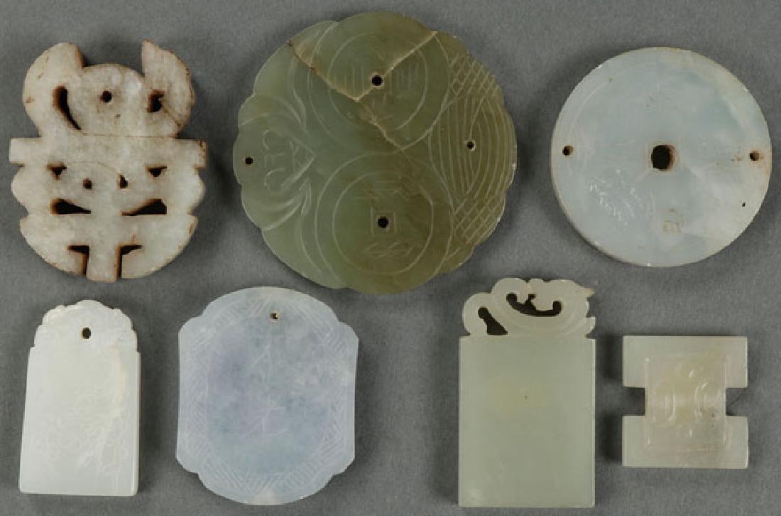 A GROUP OF SEVEN CHINESE CARVED JADE ORNAMENTS (1 of 1)