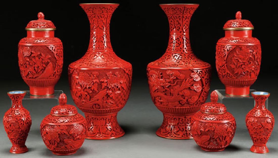 AN EIGHT PIECE GROUP OF CHINESE CARVED CINNABAR (1 of 1)