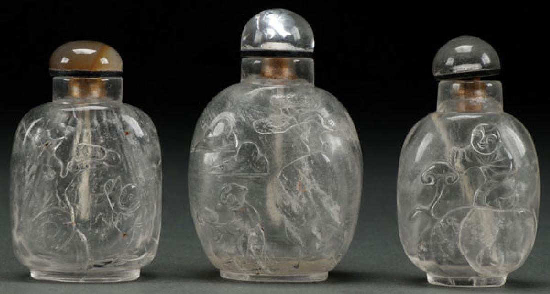 THREE CHINESE CARVED ROCK CRYSTAL SNUFF BOTTLES (1 of 1)