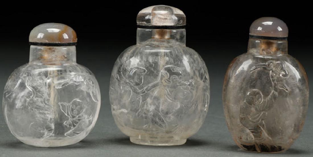 THREE CHINESE CARVED ROCK CRYSTAL SNUFF BOTTLES (1 of 1)