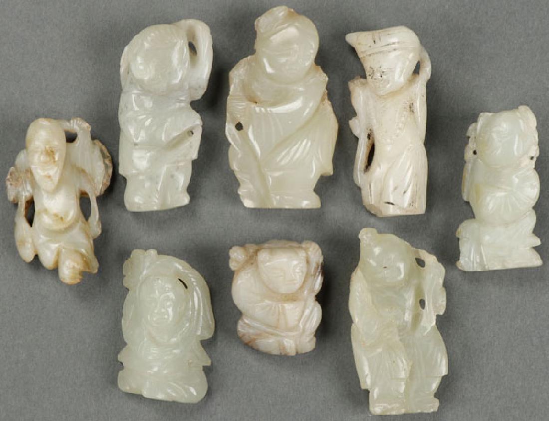 A GROUP OF EIGHT CHINESE CARVED WHITE JADE (1 of 1)