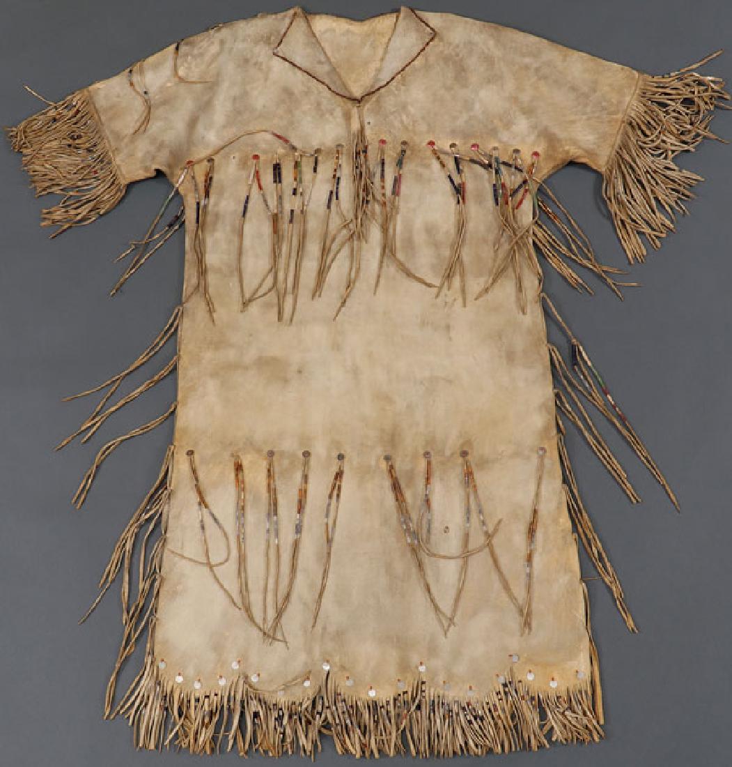 A PLATEAU ELK HIDE DRESS, CIRCA 1910 (1 of 2)