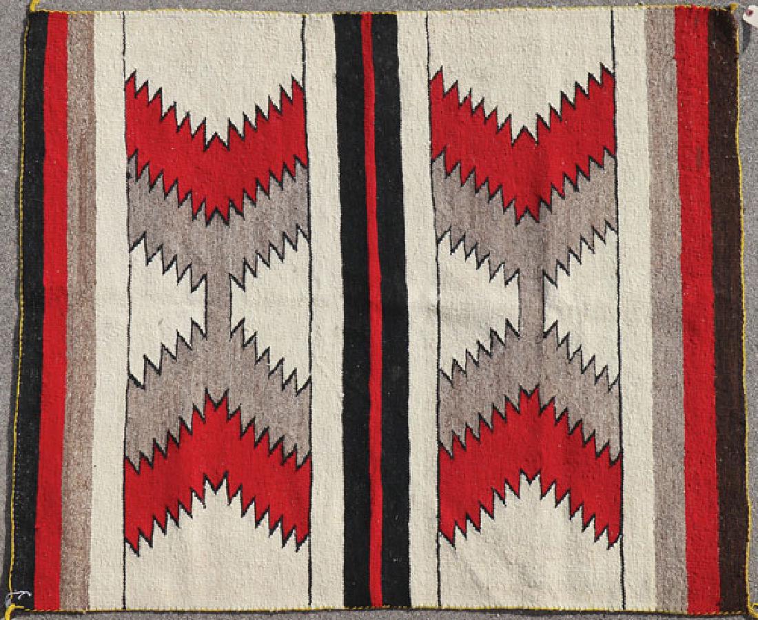 THREE NAVAJO RUGS, MID 20TH CENTURY (1 of 3)