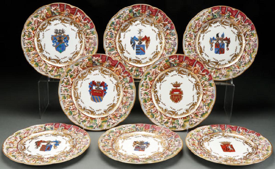 A SET OF EIGHT CAPODIMONTE ARMORIAL PLATES (1 of 2)