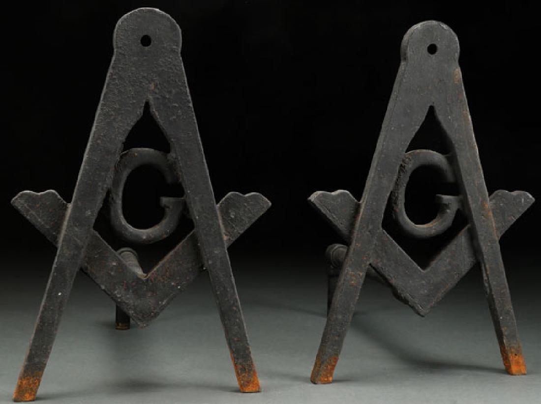 A PAIR OF MASONIC CAST IRON ANDIRONS, CIRCA 1900 (1 of 1)