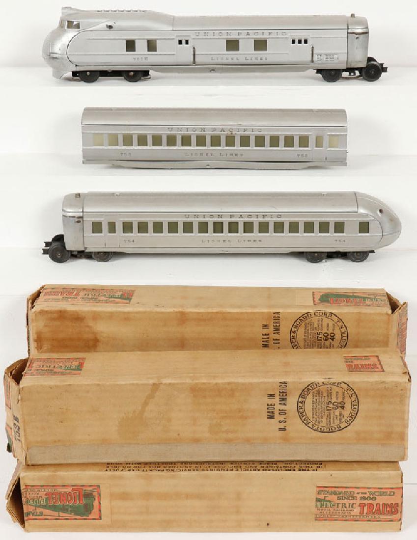 THREE GOOD LIONEL O GAUGE U.P. STREAMLINER CARS: THREE GOOD LIONEL O GAUGE U.P. STREAMLINER CARS, CIRCA 1934. Comprising a #752E power car, #753 coach and #754 observation. Each in original boxes. SHIPPING NOTICE: Jackson's is your sole and