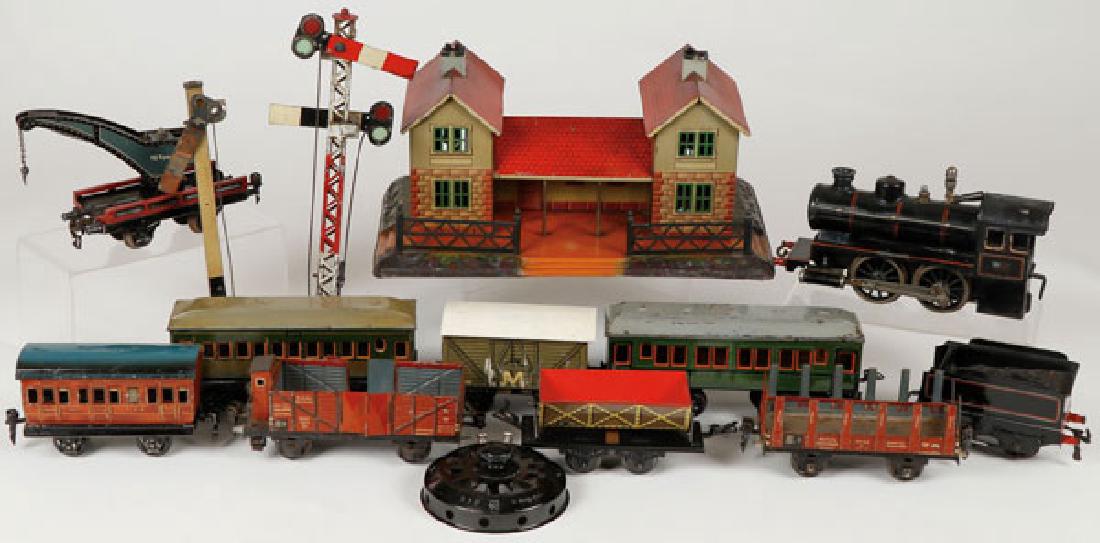 11 Piece Early German Toy Train And Accessories