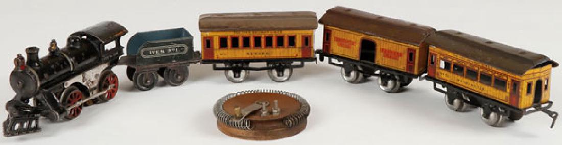 AN IVES CAST IRON O GAUGE TRAIN SET, EARLY 20TH C (1 of 6)