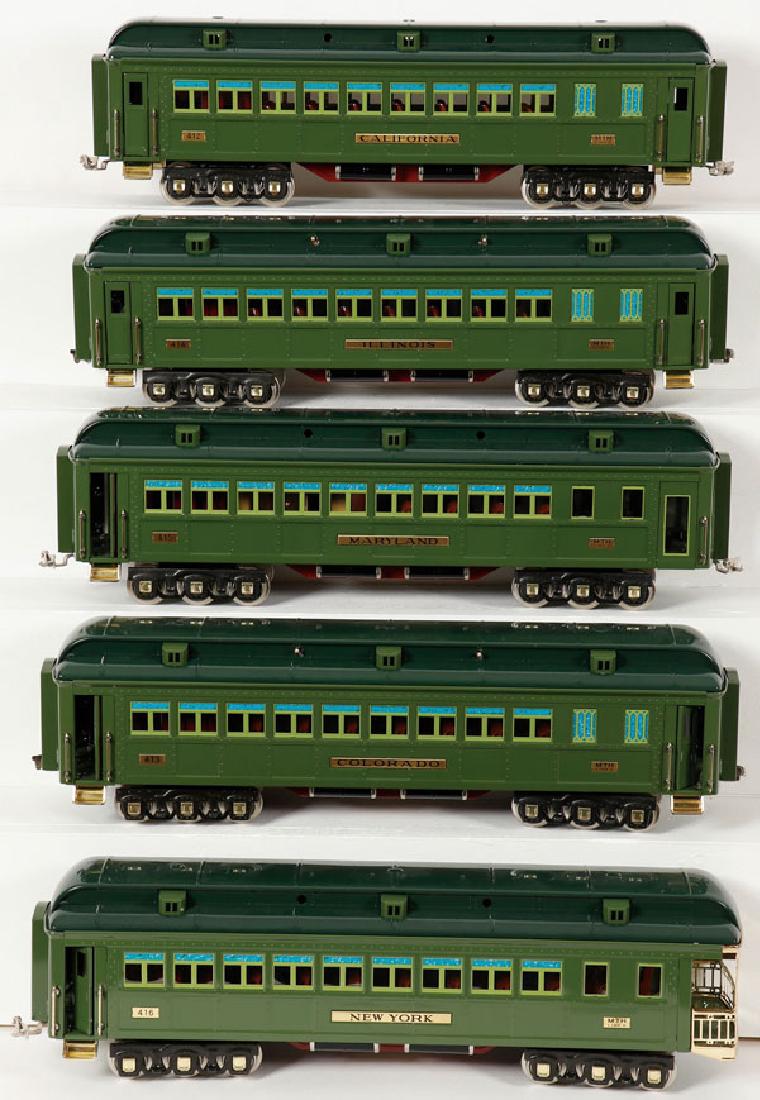 A SET OF FIVE MTH STANDARD GAUGE PULLMAN CARS: A SET OF FIVE MTH STANDARD GAUGE PULLMAN CARS, LATE 20TH CENTURY. Comprising a #412, #413, #414, #415 and #416 in two-tone green. Mint condition or new and never used. SHIPPING NOTICE: Jacks