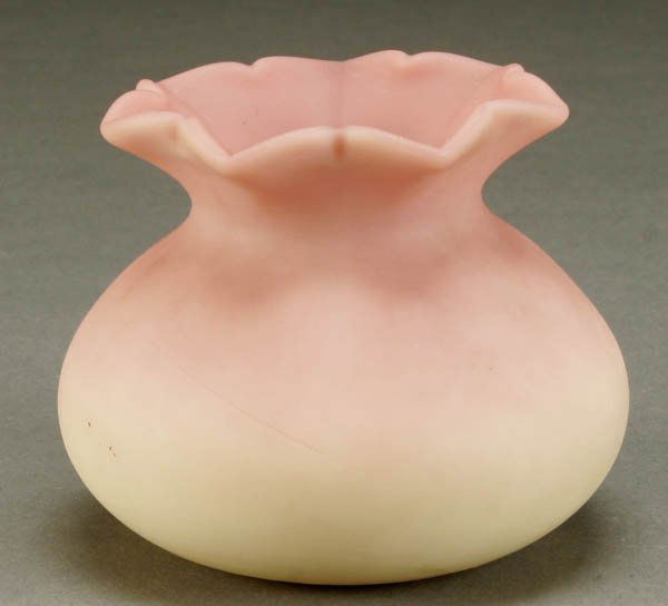 A WEBB BURMESE CABINET VASE circa 1890; squatty o: A WEBB BURMESE CABINET VASE circa 1890; squatty ovoid form in cream to salmon frosted glass; signed with a circular acid stamp Thomas Webb and Sons Queen Burmese. Height 2.75 inches. Estimate $150-$20