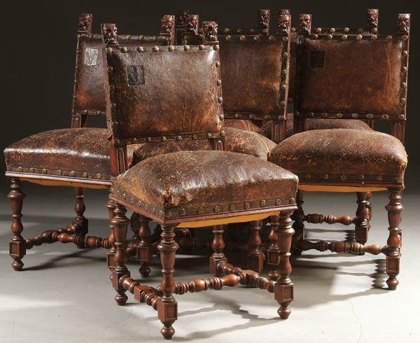 A SET OF 8 FRENCH PROVINCIAL LEATHER SIDE CHAIRS,