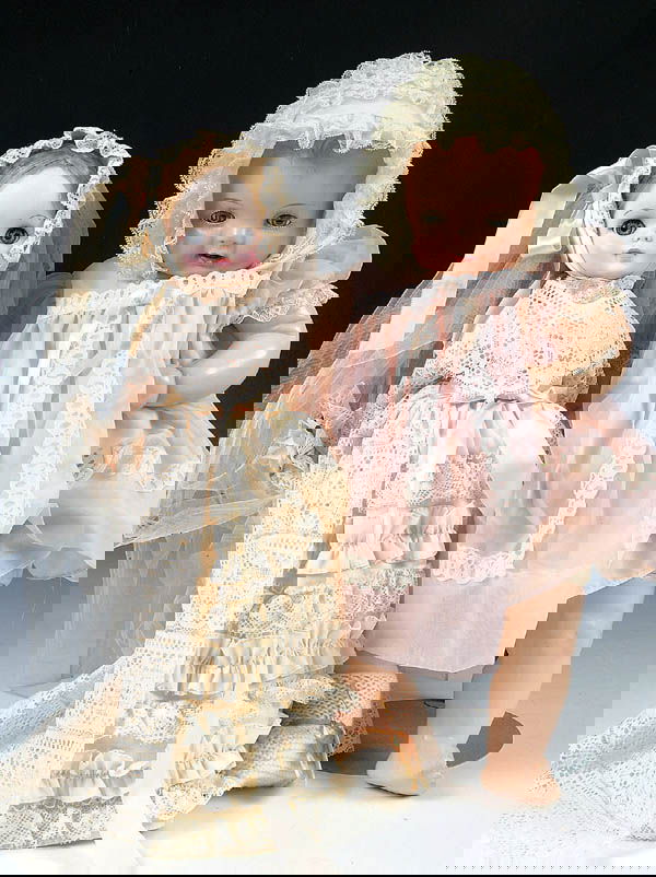 A BABY HENDREN COMPOSITION DOLL by Averill Manu.: A BABY HENDREN COMPOSITION DOLL by Averill Manu. Co. along with an Effanbee bride doll in vinyl. Height 20". Estimate $50-$75