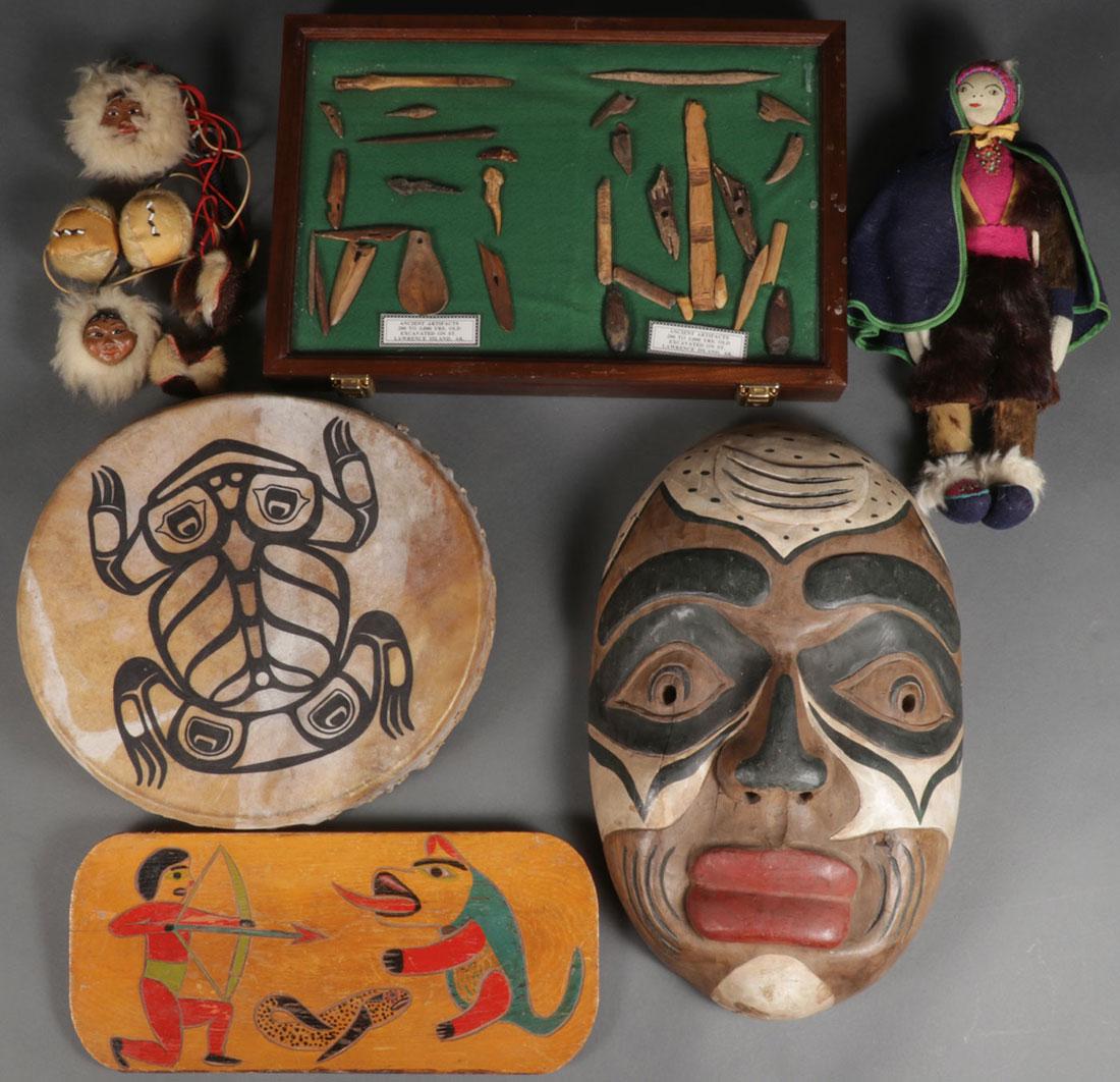 A GROUP OF MOSTLY NORTHWEST COAST ITEMS, 20TH C.: A GROUP OF MOSTLY NORTHWEST COAST ITEMS, 20TH CENTURY. Comprising a nice carved polychrome wood mask, a hide drum, an Eskimo doll, a wood tray, and a case of bone artifacts ascribed to Lawrence Island