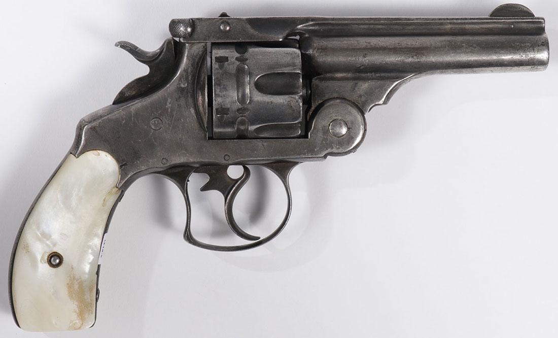 A SMITH & WESSON 44 DOUBLE ACTION REVOLVER: A SMITH & WESSON .44 DOUBLE ACTION FIRST MODEL REVOLVER. 4 inch round barrel with six shot fluted cylinder, MOP grips and matching serial numbers 4069.Requires an FFL for transfer.SHIPPI