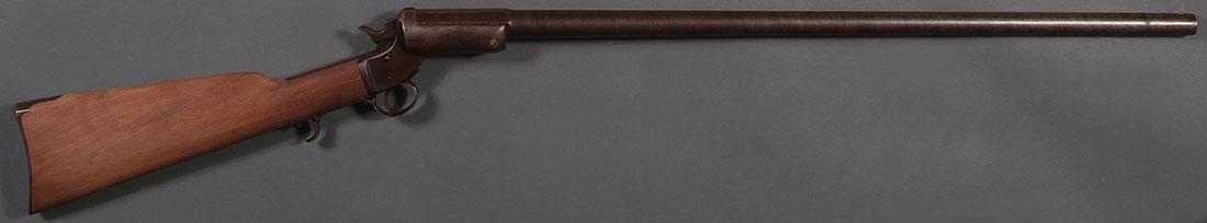 A STEVENS SINGLE SHOT TIP-UP SHOTGUN, 12 GAUGE: A STEVENS SINGLE SHOT TIP-UP SHOTGUN, .12 GAUGE. 30-inch octagon/round twist barrel, open walnut stock (refinished) serial number 6859. SHIPPING NOTICE: Jackson's is your sole and only sou