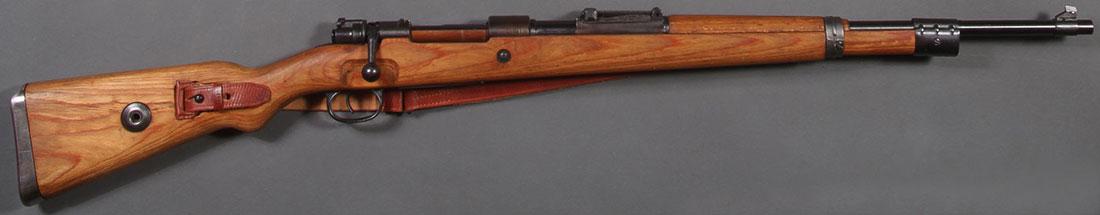 GERMAN ARMY MAUSER K98 BOLT RIFLE: GERMAN ARMY MAUSER K98 BOLT RIFLE MATCHING SERIALS DATED 1943. Maker mark BCD and 43 date, also waffenampt (partially obliterated) matching serial number #5811. Later leather sling. Requires an FFL fo