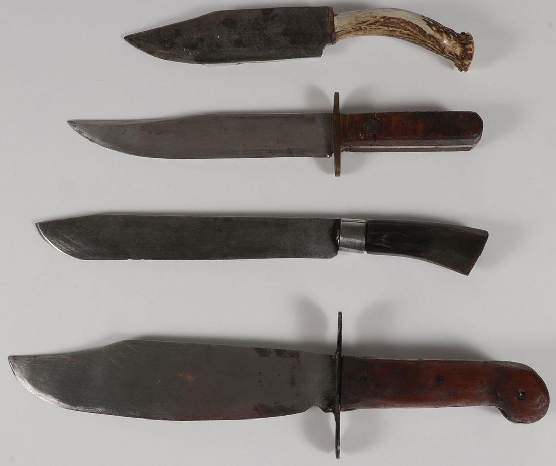 THREE BOWIE STYLE KNIVES, 20TH CENTURY: THREE BOWIE STYLE KNIVES, 20TH CENTURY. Two with wood handles, one with antler handle. Together with a 19th century horn handled knife or dagger. Greatest length 14.75 inches (37.5 cm). SHIPPING NOTIC