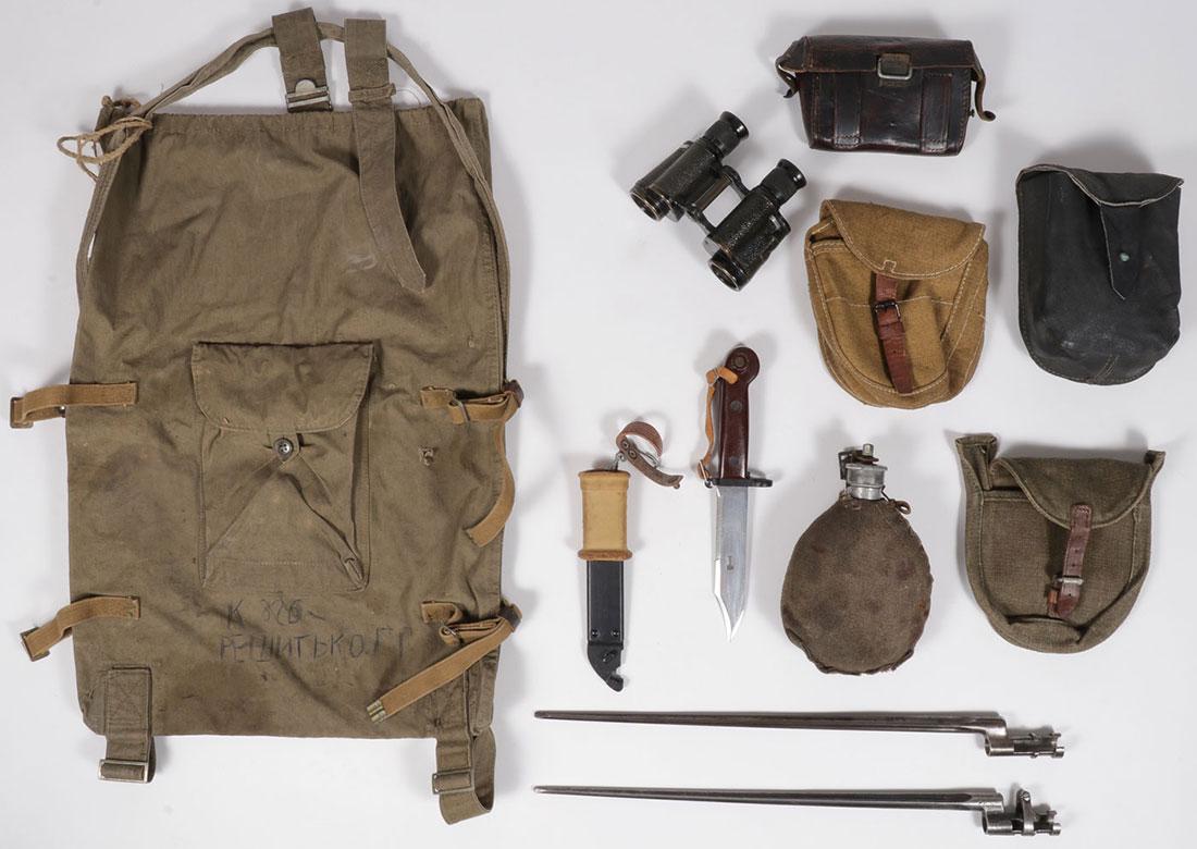 TEN RUSSIAN/SOVIET MILITARY GEAR: TEN RUSSIAN/SOVIET MILITARY GEAR ITEMS. Comprising a bayonet fighting knife, canteen, cartridge box, shoulder bag, binoculars, and other pouches, circa 1940 and later. SHIPPING NOTICE: Jac