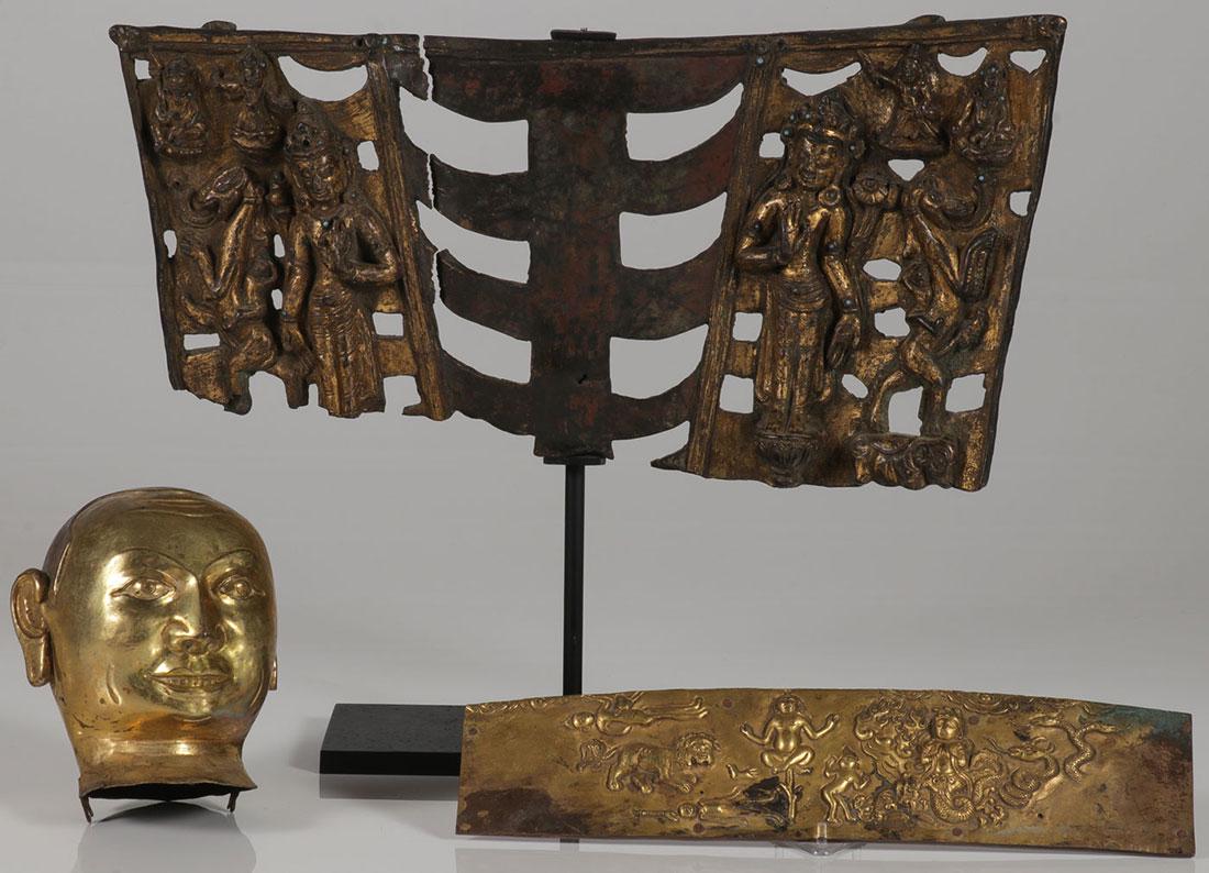 THREE SINO-TIBETAN GILT BRONZE BUDDHIST FRAGMENTS: THREE SINO-TIBETAN GILT BRONZE BUDDHIST FRAGMENTS. Comprising a gilt bronze fragment of likely a large mandorla on a contemporary iron stand, width 14.5 inches (37 cm), together with a gilt copper Bud