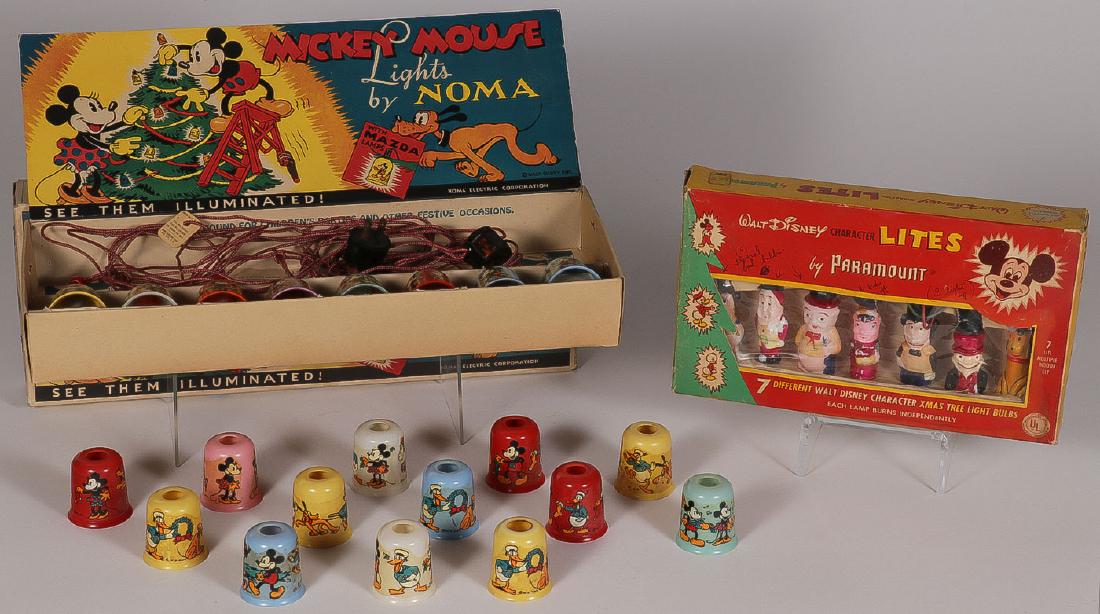 TWO SETS OF WALT DISNEY CHRISTMAS LIGHTS: TWO SETS OF WALT DISNEY CHRISTMAS LIGHTS. Comprising a set of figural lights by Paramount depicting seven different Walt Disney characters contained in original box and a set of eight lights with shad
