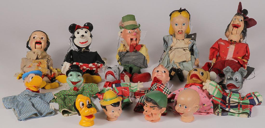 A GROUP OF 15 DISNEY MARIONETTES AND PUPPETS: AN INTERESTING GROUP OF 15 DISNEY MARIONETTES AND PUPPETS. Comprising 5 marionette puppets depicting various Disney characters including Tigerlilly, Minnie Mouse, The Mad Hatter, Alice in Wonderland,