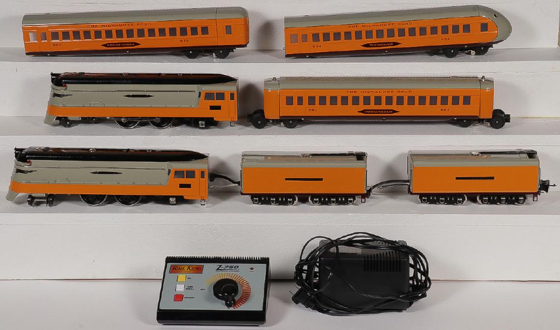 AN MTH HIAWATHA TRAIN SET & RAIL KING TRANSFORMER: A FINE MTH HIAWATHA TRAIN SET AND RAIL KING TRANSFORMER. Comprising MTH "Hiawatha" engine and a Milwaukee road tender and three cars bearing the names "Minnewawa","Wenonah", and "Ishkoodah". Together 