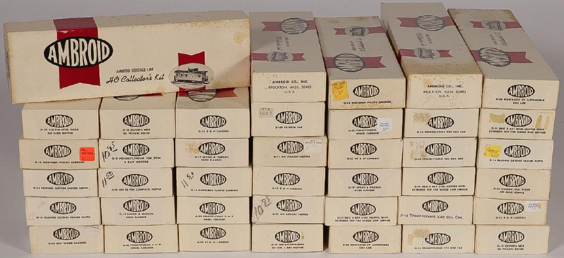39 AMBROID HERITAGE LINE COLLECTORS KITS: A GROUP OF 39 AMBROID HERITAGE LINE COLLECTORS KITS. Comprising a group of 39 Ambroid heritage line O-gauge collector's kit cars in various styles, including reefers, hoppers, boxcars, cabooses, p